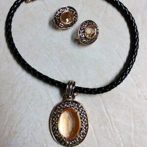 Nice pendant with leather like "chain" and matching earrings